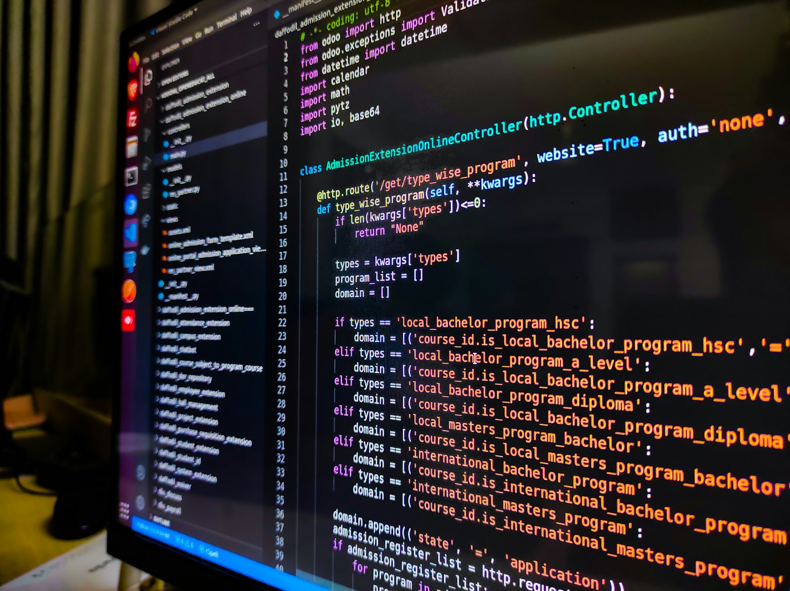 Editor full of code glowing on a dark desk setup